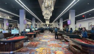 HKA5 staff members Nathan Moyer, Sean O'Brien, Christopher Reeve, Krista Best, Anthony Gallucci and James Petro at the grand opening of Resorts World New York City. PHOTO/ALLOY5