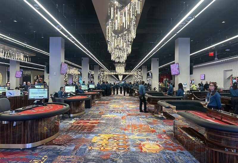 HKA5 staff members Nathan Moyer, Sean O'Brien, Christopher Reeve, Krista Best, Anthony Gallucci and James Petro at the grand opening of Resorts World New York City. PHOTO/ALLOY5