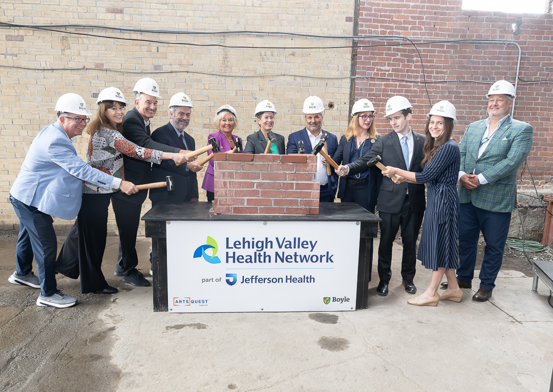 ArtsQuest hosts ‘brick breaking’ for Turn & Grind Shop repurposing