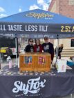 From left, Audrey Kester, Julia Kester and Tom Kester of Pivo Nova, offer tastings and sell Soul Tone beer at the Sly Fox Bock Fest and Goat Race on May 3. PHOTO/SLY FOX