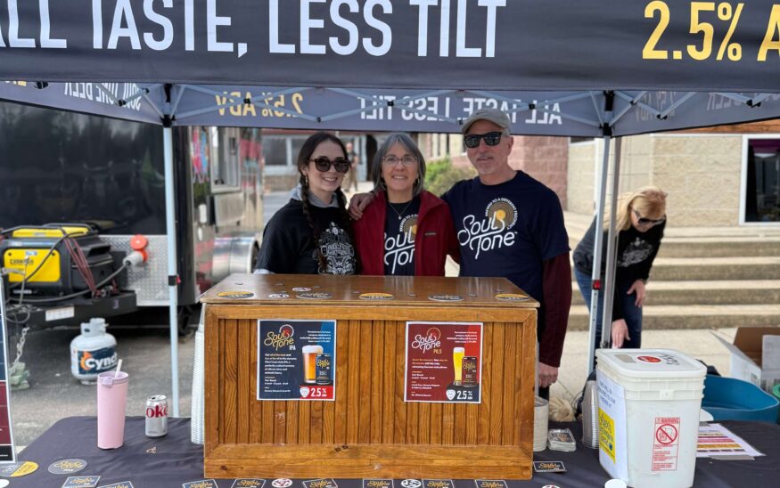 From left, Audrey Kester, Julia Kester and Tom Kester of Pivo Nova, offer tastings and sell Soul Tone beer at the Sly Fox Bock Fest and Goat Race on May 3. PHOTO/SLY FOX