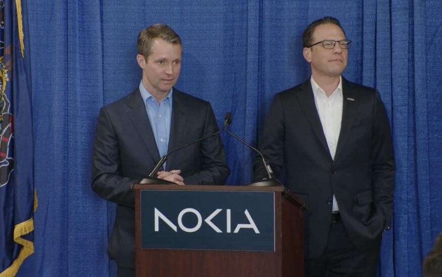 Nokia President and CEO Justin Hotard, left, and Pa. Gov. Josh Shapiro, right, announce that Nokia is investing $30M in its Allentown facility.