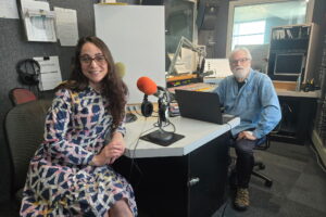 Volunteer music programmer, Bill Dautremont-Smith, hosts community member, Elizabeth Ortiz, on “My Three Songs,” a segment where guests share 3 songs that influenced their lives. PHOTO/WDIY